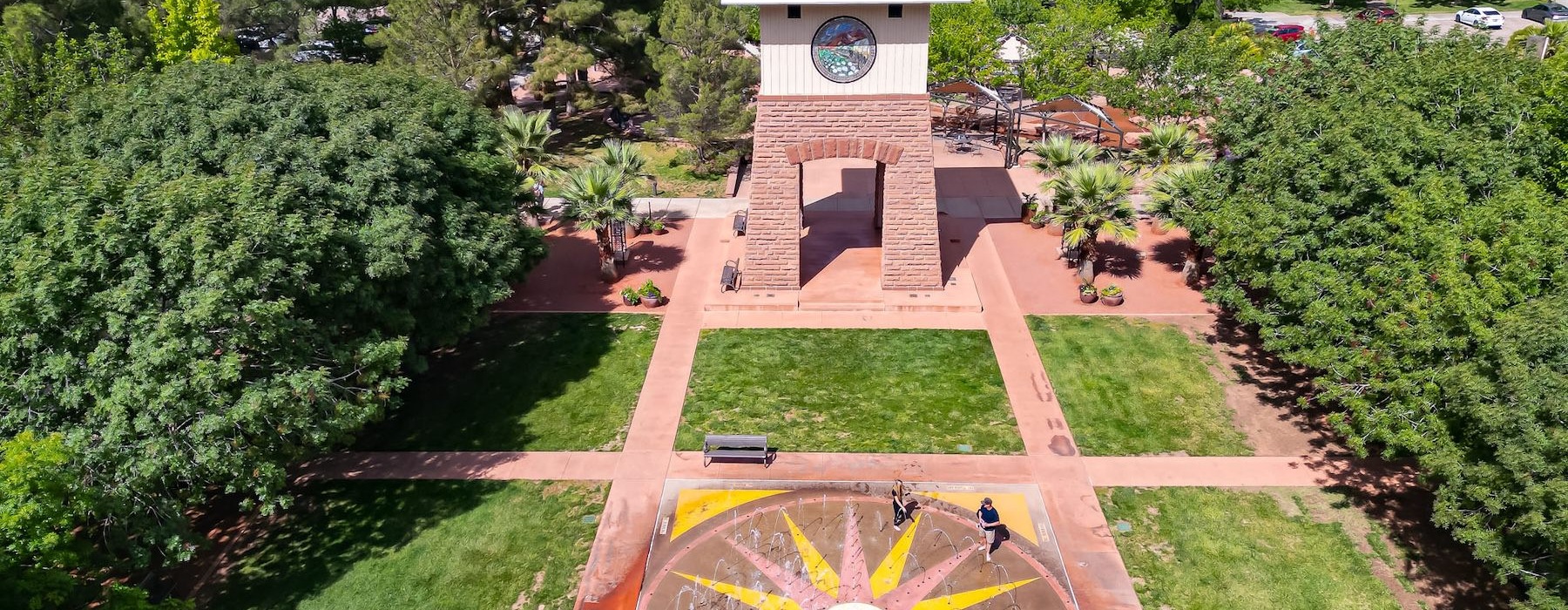 a clock tower in a park