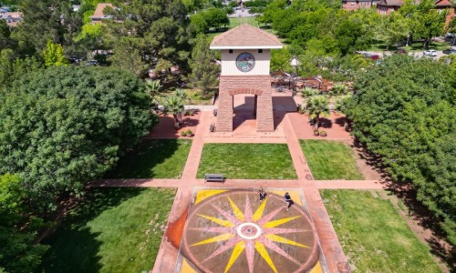 a clock tower in a park